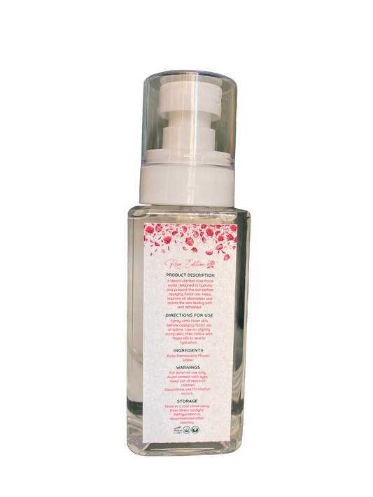 Clear bottle with pump and red label