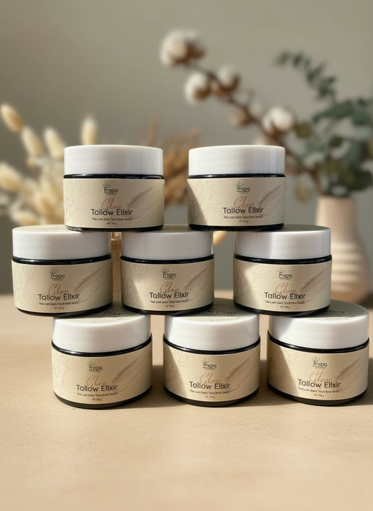 Stack of TALLWO with labels on a wooden surface