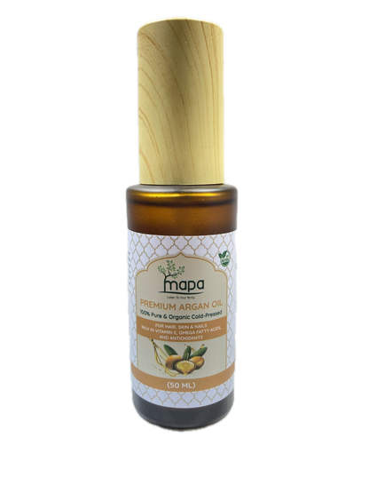 Bottle of MAPA Argan Oil with wooden applicator on a white background